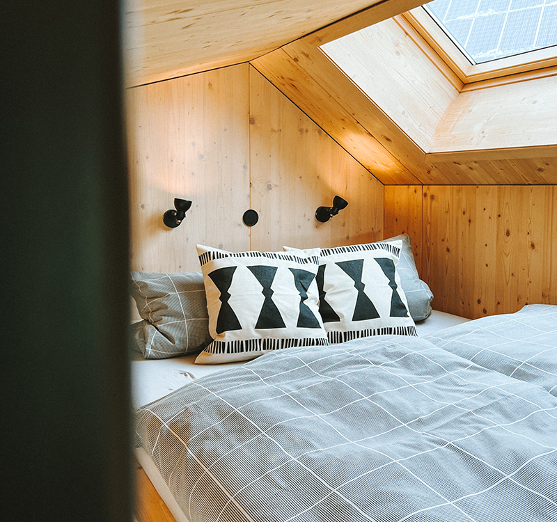 Tiny House Hilde Bett mit Blick in die Sterne